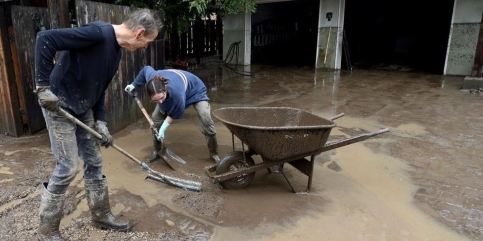 California deluge forces mass evacuations, boy swept away