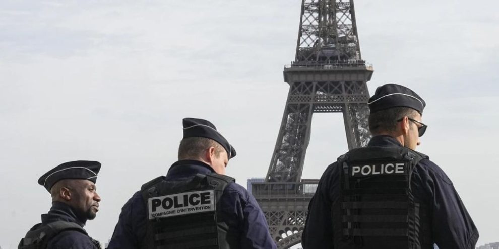 Stranded on the Eiffel Tower, a couple decide to wed, with an AP reporter there to tell the story