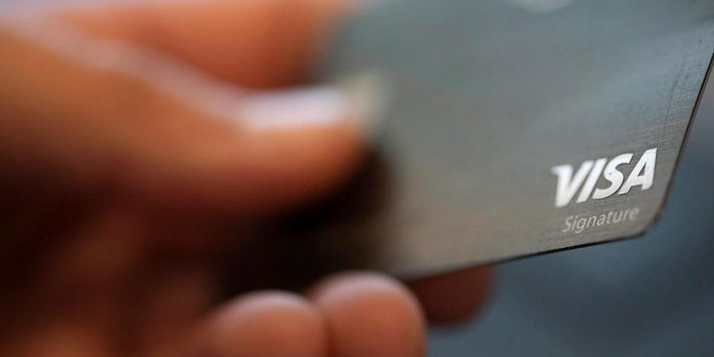 Credit card debt at record high amid stubbornly hot inflation