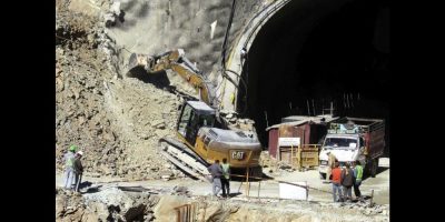 India workers trapped in tunnel - AP