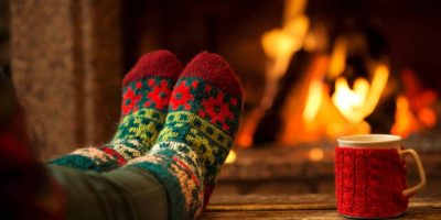 fire cozy socks mug warm fireplace