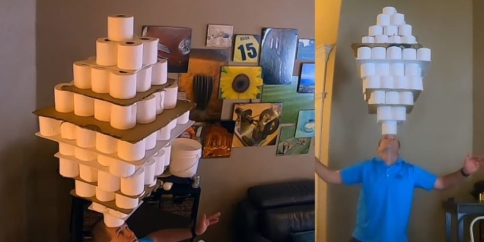 Man sets record for balancing rolls of toilet paper on his forehead