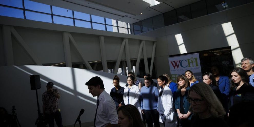 Prime Minister Justin Trudeau is silhouetted as he speaks to the press during an announcement at Women’s College Hospital, in Toronto, Thursday, March 7, 2024.