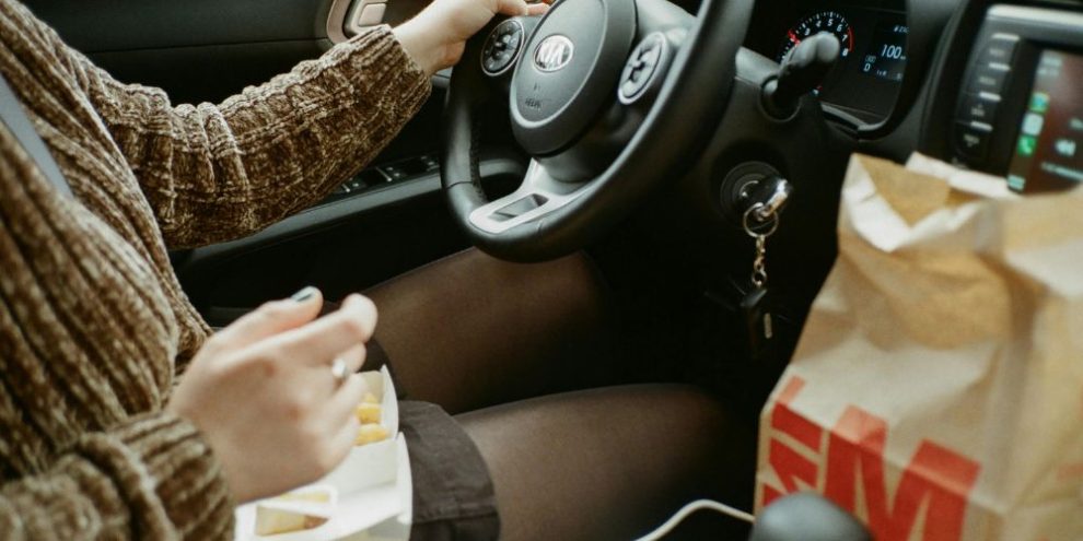 driving, fast food, car via pexels by Darya Sannikova