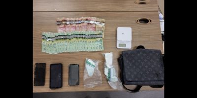 The seized items included 320 grams of cocaine, Canadian currency amounting to $940, a digital scale, and two cellular/mobile phones, an iPhone and a Samsung.