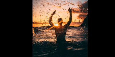 man beach via pexels by Jacub Gomez