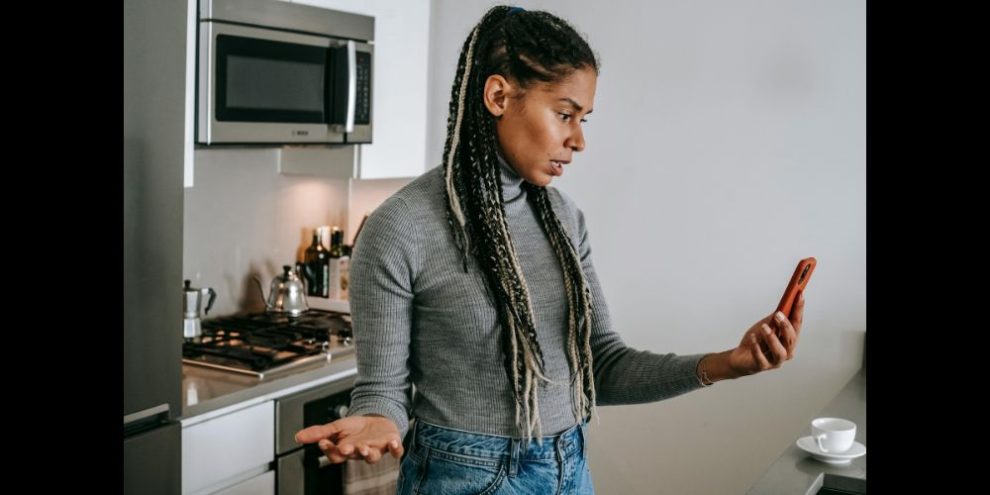 women on phone via pexels by Alex Green