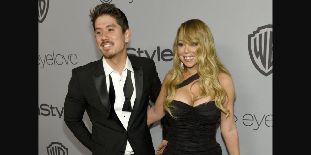 Bryan Tanaka, left, and Mariah Carey via AP by Chris Pizzello/Invision/AP, File