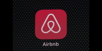 FILE - The Airbnb app icon is displayed on an iPad screen in Washington, D.C., on May 8, 2021. Airbnb says it’s banning the use of indoor security cameras in listings around the world by the end of next month. The San Francisco-based online rental platform said it making the change to simplify its security camera policy and continue efforts to prioritize privacy. (AP Photo/Patrick Semansky, File)