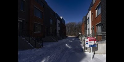 The Canadian Real Estate Association is expected to release February home sales figures on Monday. A "sold" sign in a new housing development in Lasalle, a borough of Montreal, is shown on Monday, Feb. 19, 2024. THE CANADIAN PRESS/Christinne Muschi