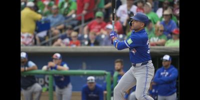 Toronto Blue Jays’ Joey Votto hits a solo home run off Philadelphia Phillies starter Zack Wheeler during the first inning of a spring training baseball game at BayCare Ballpark, Sunday, March 17, 2024, in Clearwater, Fla. THE CANADIAN PRESS/Steve Nesius