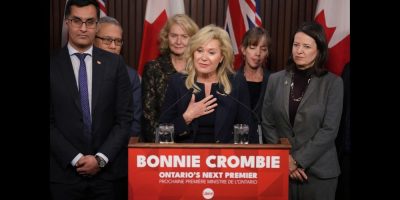 Ontario Liberal Leader Bonnie Crombie says if she is premier after the 2026 election, she will not introduce a provincial carbon tax. Crombie stands with Ontario Liberal caucus members as she talks to the media at the Queens Park Legislature in Toronto on Tuesday, December 5, 2023. THE CANADIAN PRESS/Chris Young