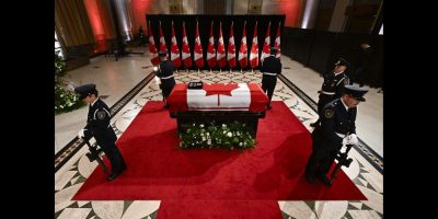 Sentinels surround the casket of former prime minister Brian Mulroney as he lies in state at the Sir John A. Macdonald Building, across from Parliament Hill in Ottawa, on Tuesday, March 19, 2024. THE CANADIAN PRESS/Justin Tang