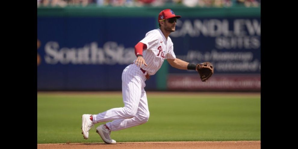 Philadelphia Phillies shortstop Trea Turner watches a ground ball in the fourth inning of a spring training baseball game against the New York Yankees Monday, March 11, 2024, in Clearwater, Fla.THE CANADIAN PRESS/AP/Charlie Neibergall