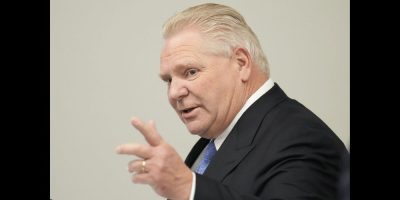 Ontario Premier Doug Ford attends an announcement in Belleville, Ont., on Friday, March 1, 2024. Ford says his government will build as many jails as needed to keep criminals behind bars "for a long time." THE CANADIAN PRESS/Chris Young