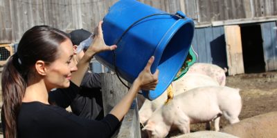 Ripe Owners Meghan & Lindsay feeding animals pulp at Wishing Well Animal Sanctuary