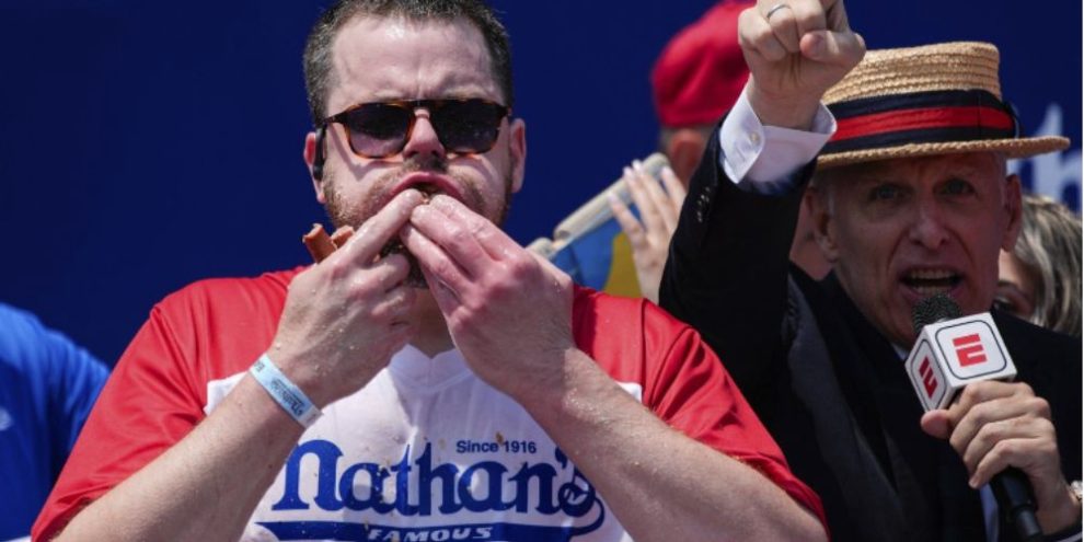 Patrick Bertoletti of Chicago wins his first men’s title at annual Nathan’s hot dog eating contest.