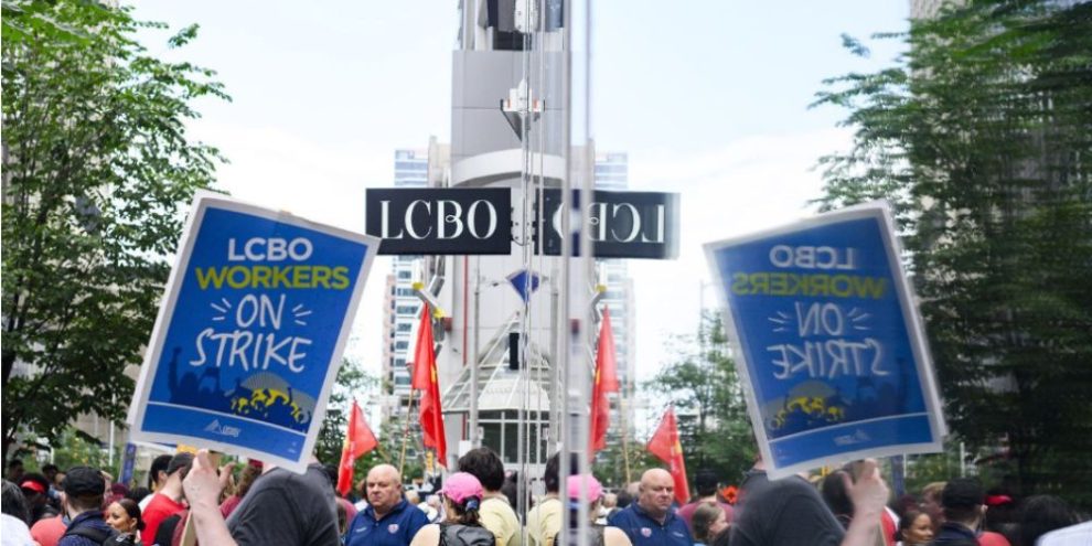 Dozens of LCBO workers rally in downtown Toronto on day 2 of historic strike