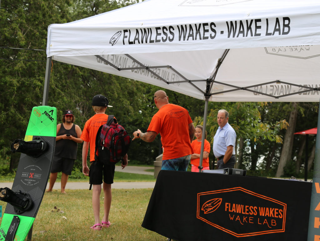 Flawless Wakes Owner Michael Therrien rounds the troops before prepping for kids camp. 