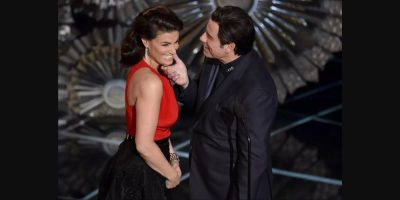 Idina Menzel, Travolta Oscars VIA AP John Shearer / Invision / Associated Press)