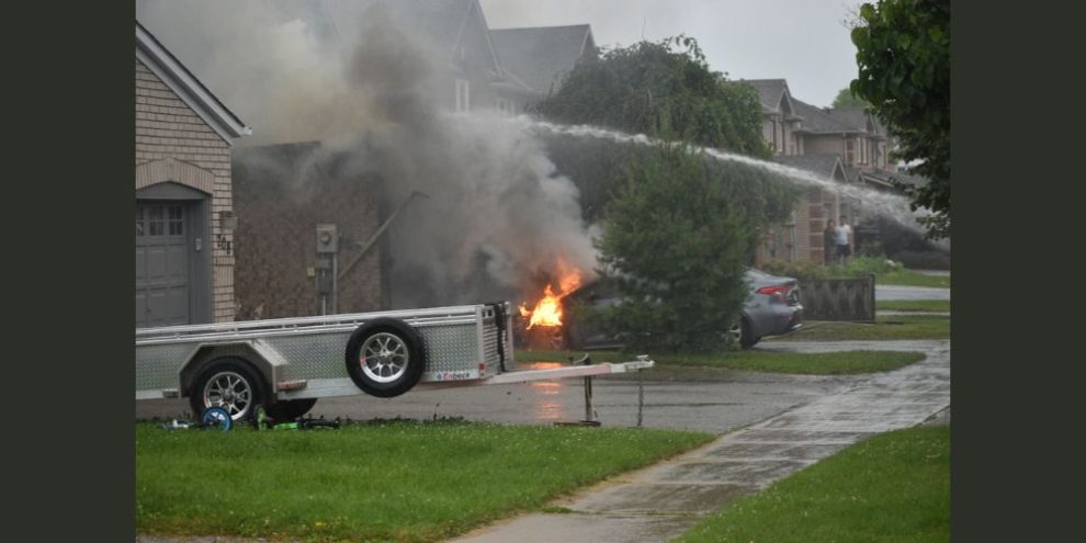 Water dousing a house fire