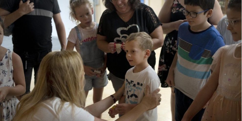 An Israeli boy who broke an ancient jar learns how the museum is piecing it back together