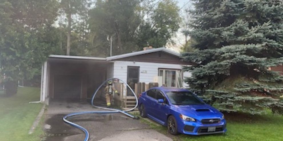 Man dead after garage fire at Midland home