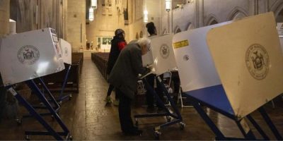 A voter casts a ballot at the Church of the Heavenly Rest in New York on Election Day,