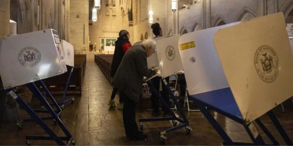 A voter casts a ballot at the Church of the Heavenly Rest in New York on Election Day,