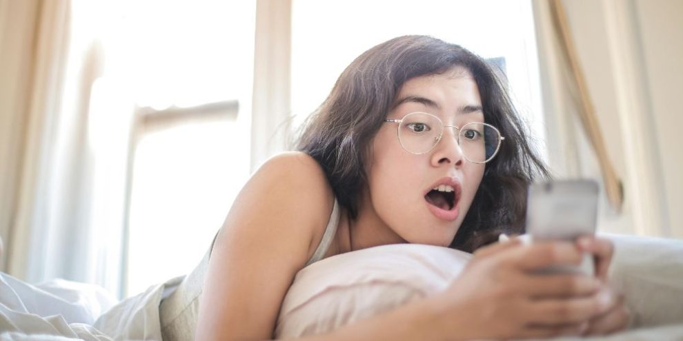 woman on phone via pexels by Andrea Piacquadio