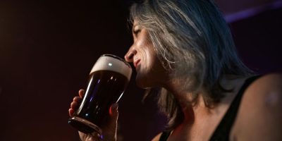 woman drinking beer- Pexels by RDNE Stock project