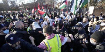 Pro-Palestine protesters and pro-Israel protesters face off at a demonstration at a synagogue in Thornhill, Ont.