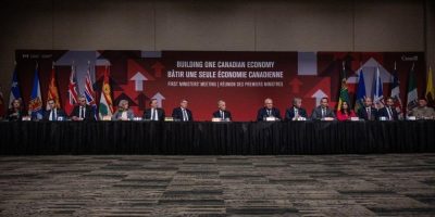 Prime Minister Mark Carney, centre, and the Premiers of Canada speak to media following the First Minister’s Meeting in Saskatoon, Sask.