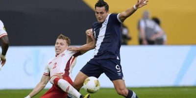 Canada defender Alistair Johnston (2) and Guatemala forward Rubio Mendez (9) battle for possession of the ball