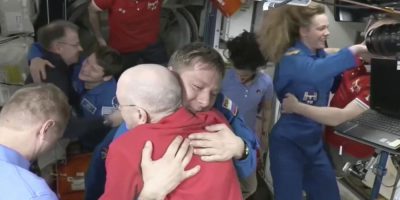 NASA's stuck astronauts welcome their newly arrived replacements to the space station