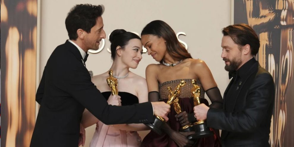 Adrien Brody took home his second leading man Oscar for “The Brutalist,” Mikey Madison took home the best actress statuette and “Anora” was crowned best picture on its way to five awards Sunday. Kieran Culkin won the Oscar for best supporting actor for his work on “A Real Pain” and Zoe Saldaña won for her work in “Emilia Pérez.” Sean Baker had a stunning night, winning the screenplay, director and editing awards for “Anora.” “Flow” beat “The Wild Robot” for best animated feature film while Paul Tazewell became the first Black man to win an Oscar for costume design for his work on “Wicked.” Here’s the complete list of winners at the 97th annual Academy Awards: Best picture “Anora” Best Actor Adrien Brody, “The Brutalist” Best Actress Mikey Madison, “Anora” Director Sean Baker, “Anora” Best Supporting Actress Zoe Saldaña, “Emilia Pérez” Best Supporting Actor Kieran Culkin, “A Real Pain” International Film “I’m Still Here” Documentary Feature “No Other Land” Advertisement Original Screenplay “Anora,” Sean Baker Adapted Screenplay “Conclave,” Peter Straughan Original Score “The Brutalist,” Daniel Blumberg Original Song “El Mal” from “Emilia Pérez” Animated Film “Flow” Visual Effects “Dune: Part Two” Costume Design “Wicked,” Paul Tazewell Cinematography “The Brutalist,” Lol Crawley Documentary Short Film “The Only Girl in the Orchestra” Best Sound “Dune: Part Two” Production Design “Wicked” Makeup and Hairstyling “The Substance” Film Editing “Anora,” Sean Baker Live Action Short Film “I’m Not a Robot” Animated Short Film “In the Shadow of the Cypress”