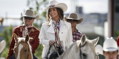Parade Marshal Shania Twain, centre, rides a horse during the Calgary Stampede parade in Calgary