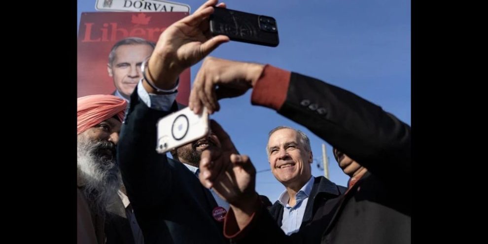 Mark Carney taking phots with supporters