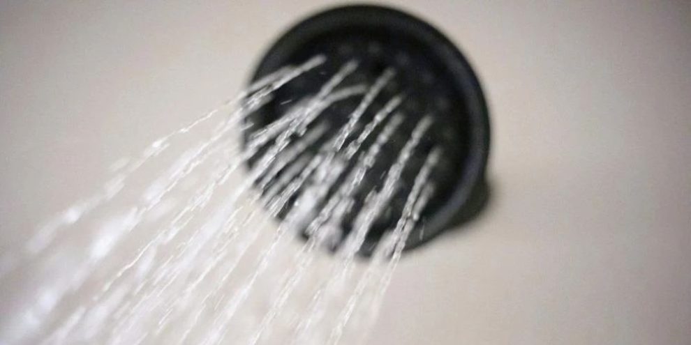 Running shower head