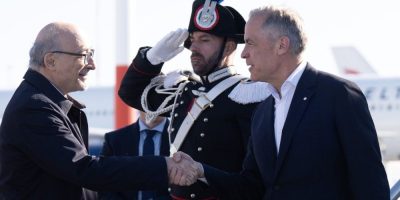 Mark Carney shakes hands with Cristiano Gallo