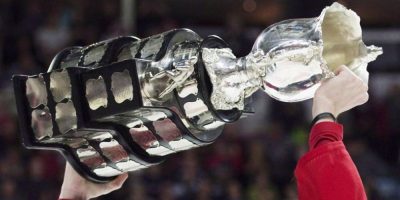 Player raising Memorial Cup