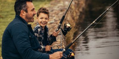 dad and son fishing on Canada Day for free