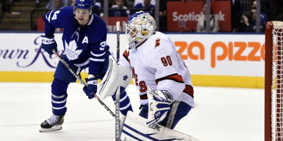 Toronto Maple Leafs center John Tavares (not shown) scores his team’s second goal of an NHL hockey game against Carolina Hurricanes emergency goalie David Ayres (90)