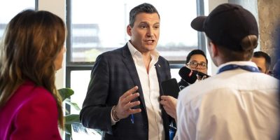 Minister of A.I. and Digital Innovation Evan Solomon speaks to media following an announcement during a visit to Scale AI