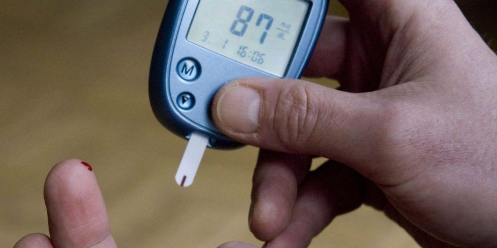 a person with diabetes testing his blood sugar level in Kamen, Germany