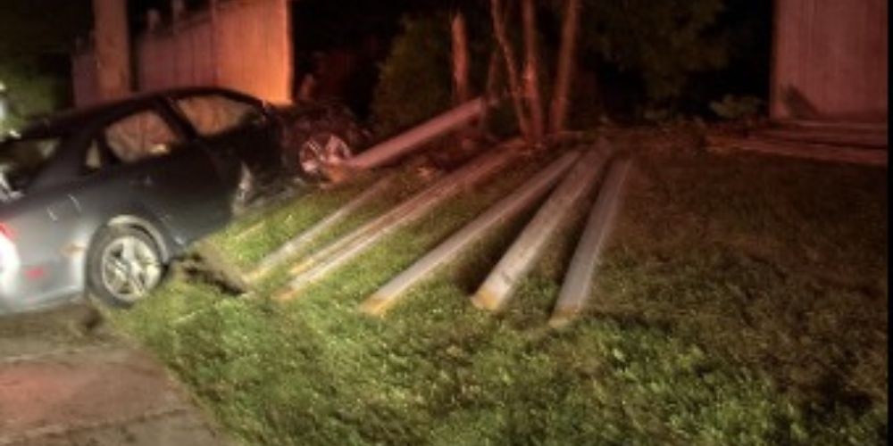 Car plows into fence in Barrie, driver charged with impaired
