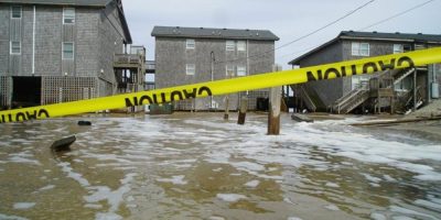 Hurricane Erin stirs up strong winds and floods part of a NC highway as it creeps up the East Coas