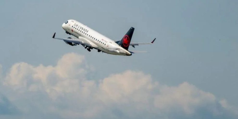 Air Canada flight attendants vote in favour of strike mandate