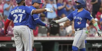 Springer goes deep twice as Blue Jays beat Reds 12-9 despite shaky pitching