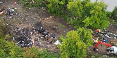 Barrie firefighters doused a blaze in a debris pile at a former homeless encampment
